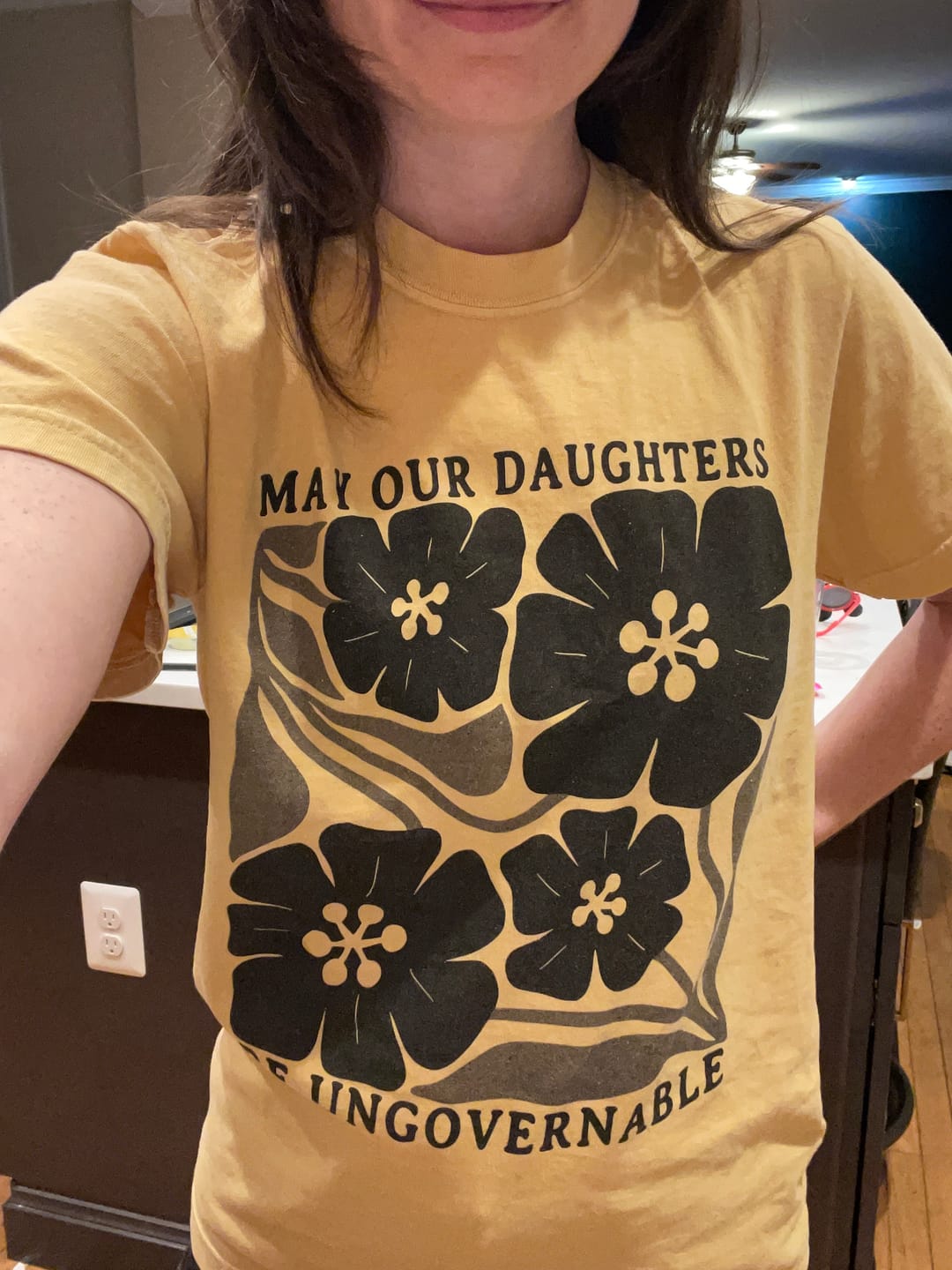Customer photo review of May Our Daughters Be Ungovernable Tee