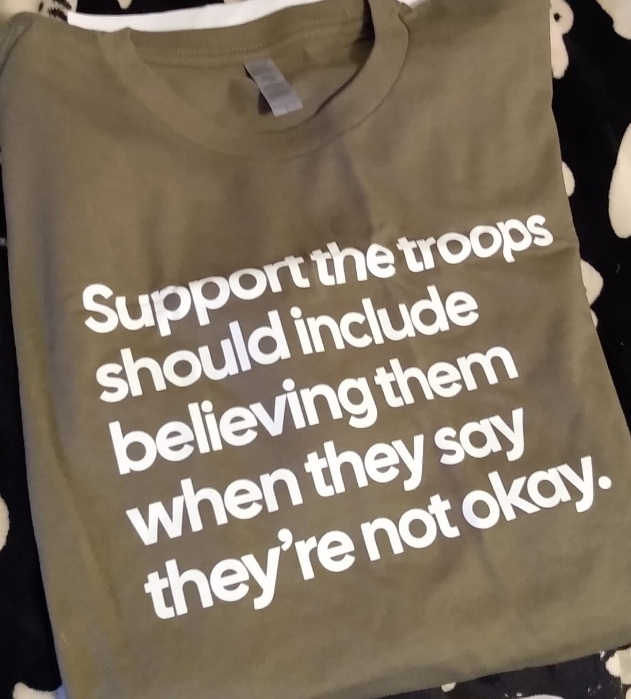 Customer photo review of Support the Troops Should Include Believing Them When They Say They’re Not Okay Unisex Tee