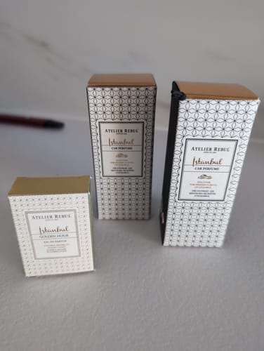 Customer's Istanbul Autoparfum boxes and one small perfume bottle on a surface.