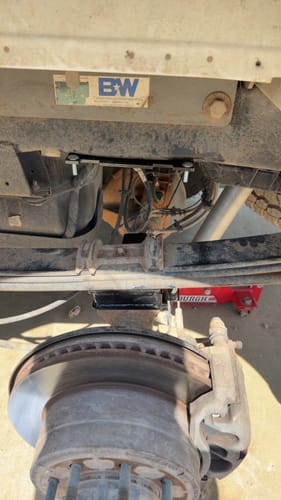 Customer's Apoc Industries rear block installed on a truck chassis, featuring a black powder-coated finish.