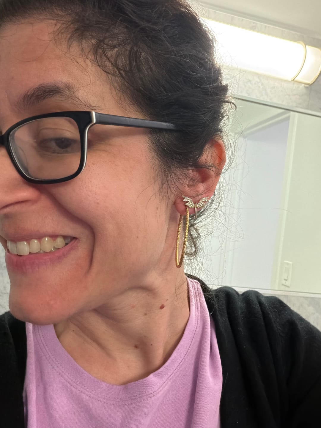 Customer photo review of Golden Wing Stud Earrings – Stainless Steel & Zirconia | Minimal Luxury Jewelry
