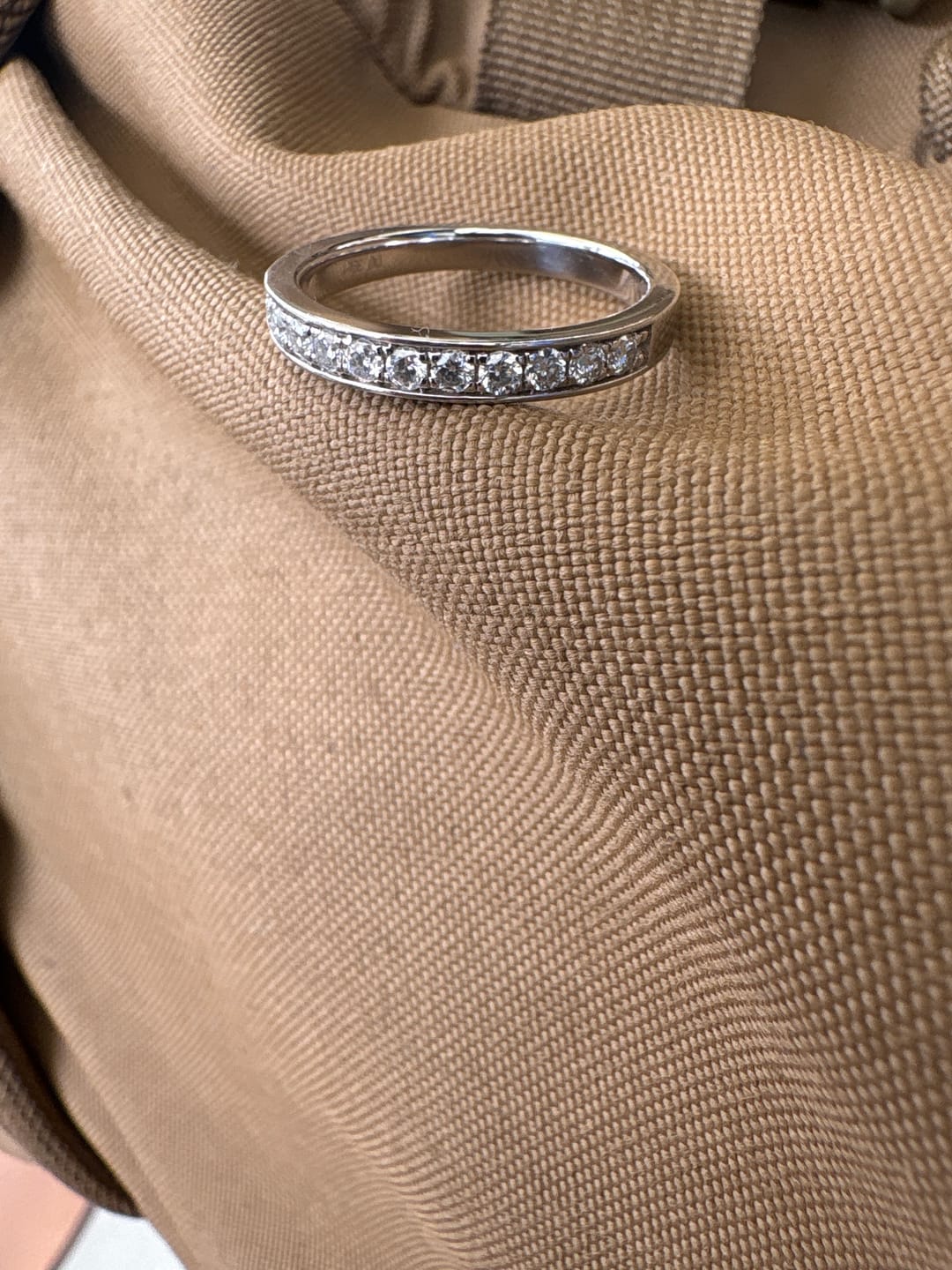 Customer photo review of Doveggs half eternity channel set moissanite/lab grown diamond wedding band-2.5mm band width