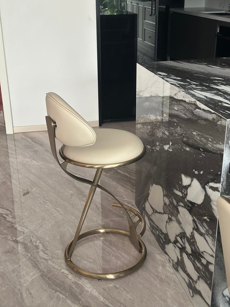 Customer photo review of Modern Beige Upholstered Sculpted Metal Curved Back Bar Stool