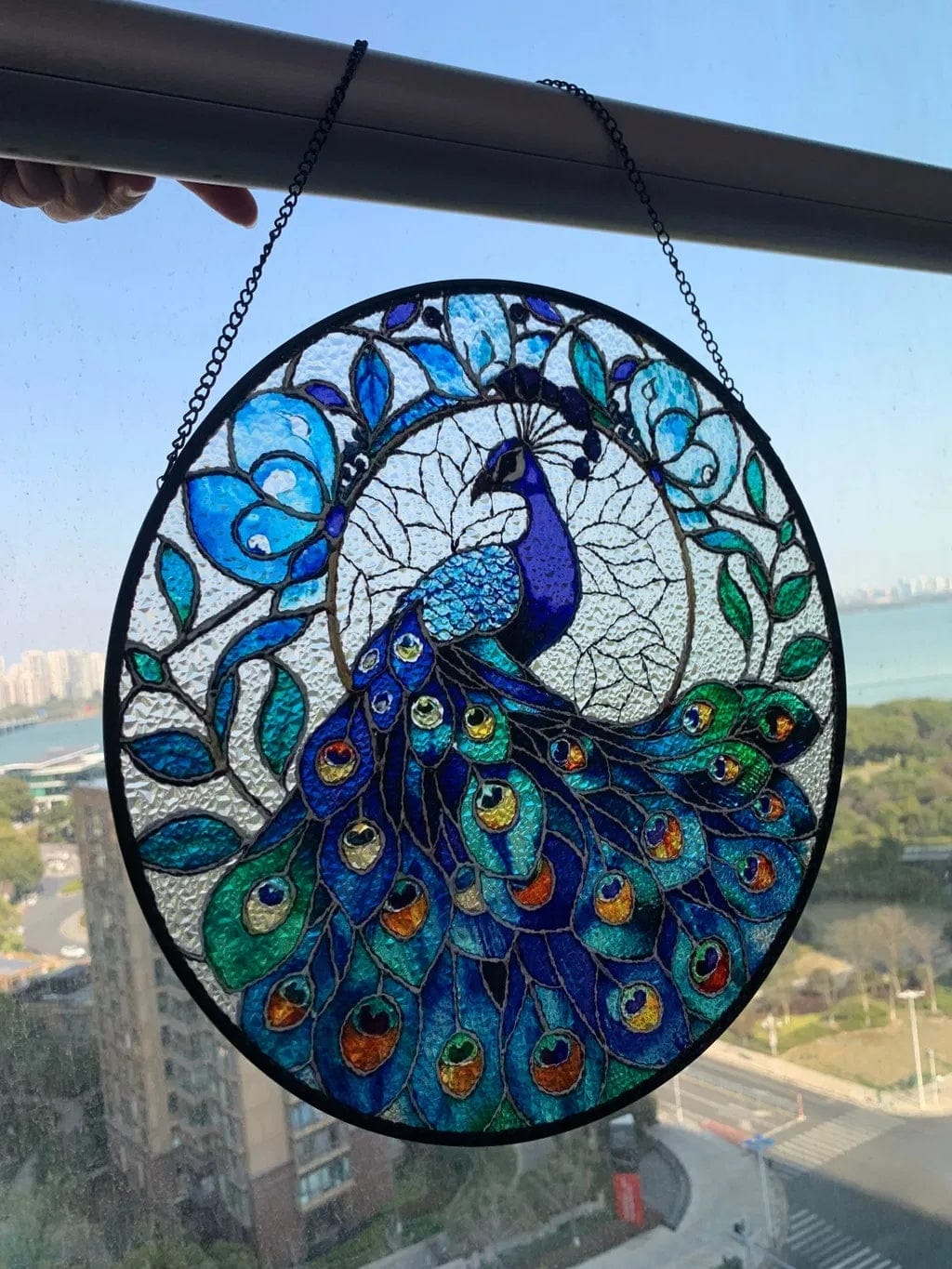 Customer photo review of Stained Glass Suncatcher – Majestic Blue Peacock