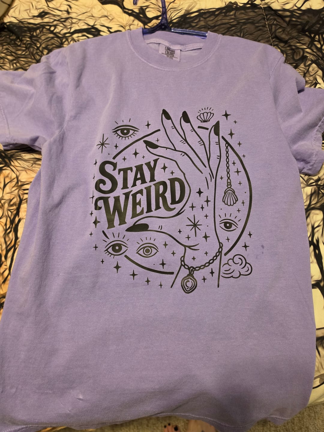 Customer photo review of Stay Weird TEE