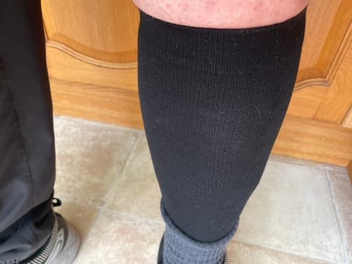 Customer's black EverSock Bamboo Open Toe Compression Socks worn on a leg with comfortable fit.