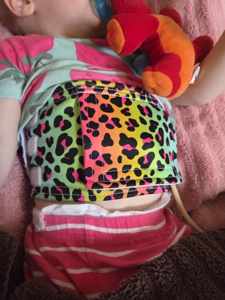 Customer photo review of Rainbow Cheetah Feeding Tube Belt