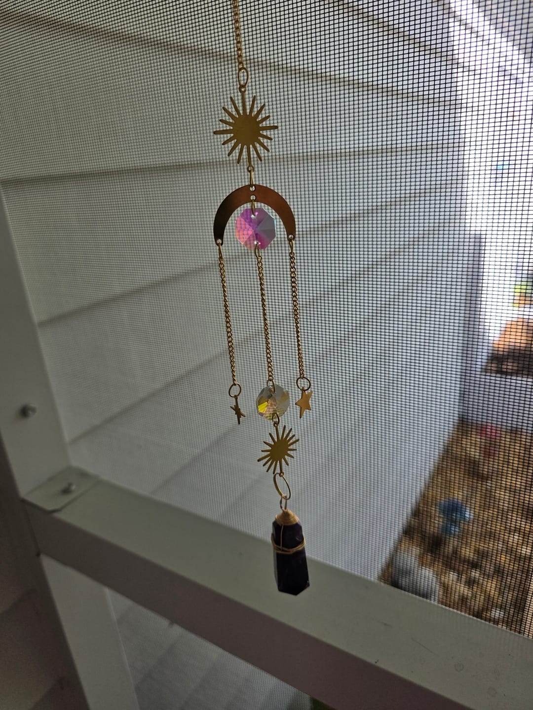 Customer photo review of Natural Crystal Double-Point Suncatcher