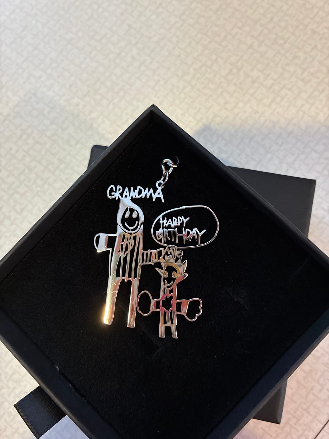 Customer photo review of Personalized Child Drawing Necklace or Keychain