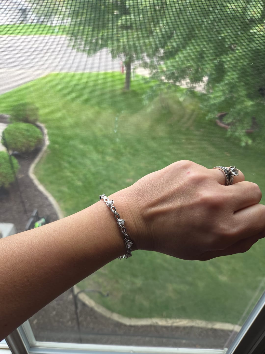 Customer photo review of Amanda 18k White Gold Plated Infinity Heart Tennis Bracelet with Simulated Diamond Crystals