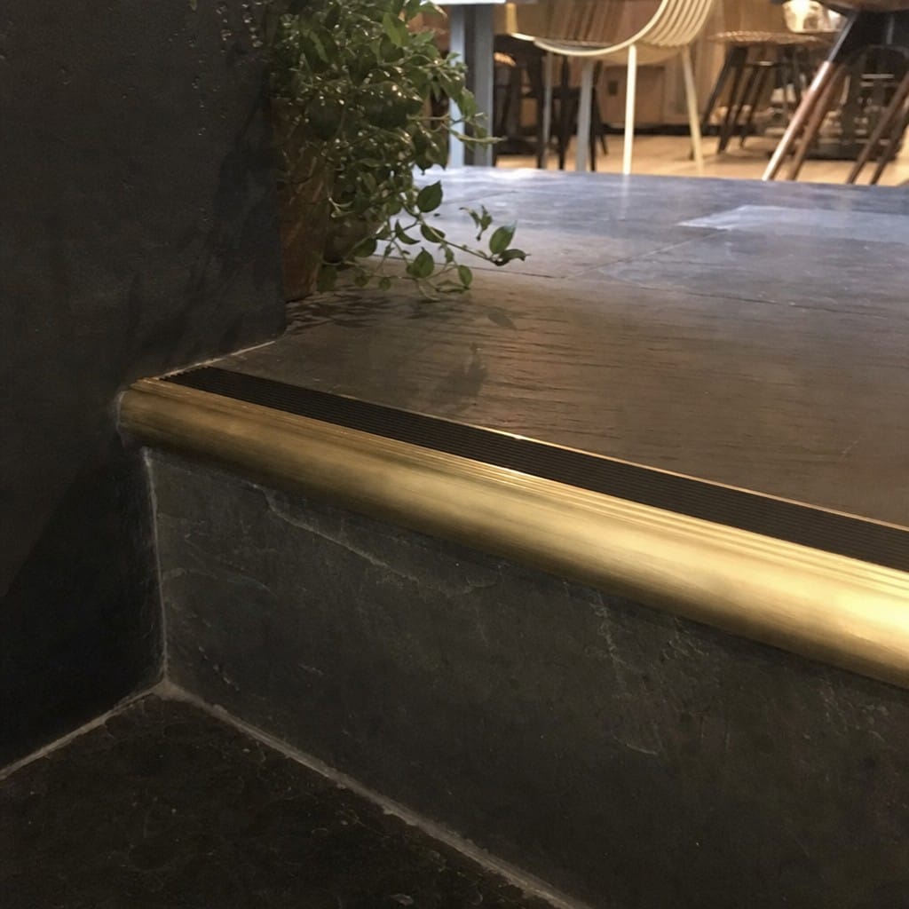 Customer photo review of Solid Brass Raked Back Stair Nosing Cut to Any Size
