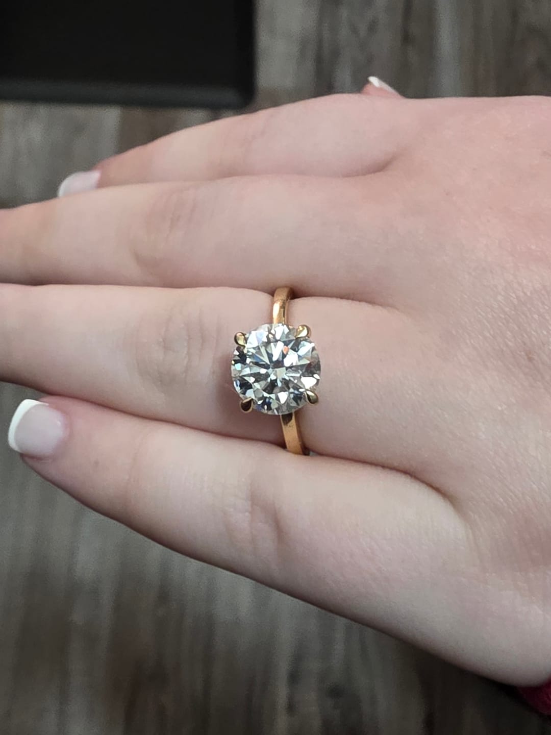 Customer photo review of April 3.5 Carat Round Solitaire Moissanite Diamond Ring in 14k Yellow Gold
