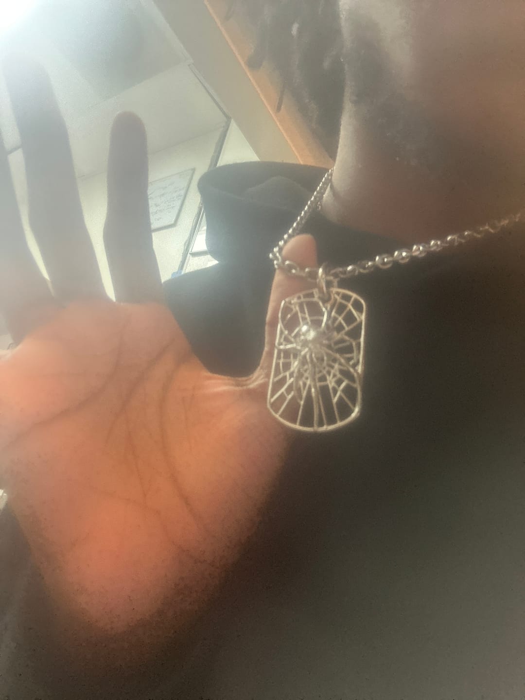 Customer photo review of SPIDER DOG TAG NECKLACE