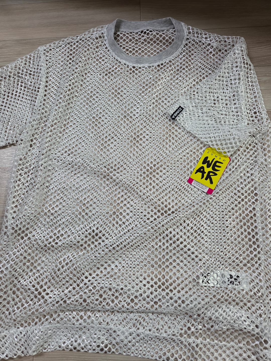 Customer photo review of Worldwide Unisex Mesh Crew Neck Top