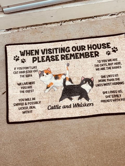 Customer photo review of Please Remember When Visiting Cats House Personalized Doormat
