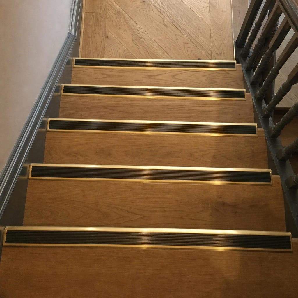 Customer photo review of Solid Brass Raked Back Stair Nosing Cut to Any Size