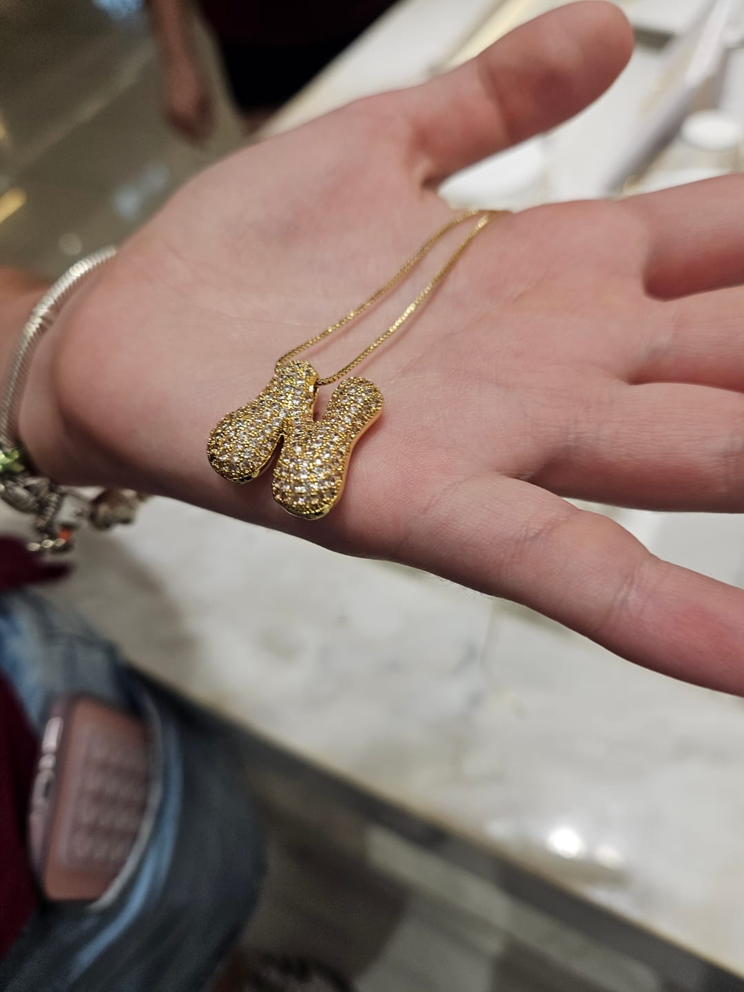 Customer photo review of Collar Dorado Inicial Mini Bubble Zirconias