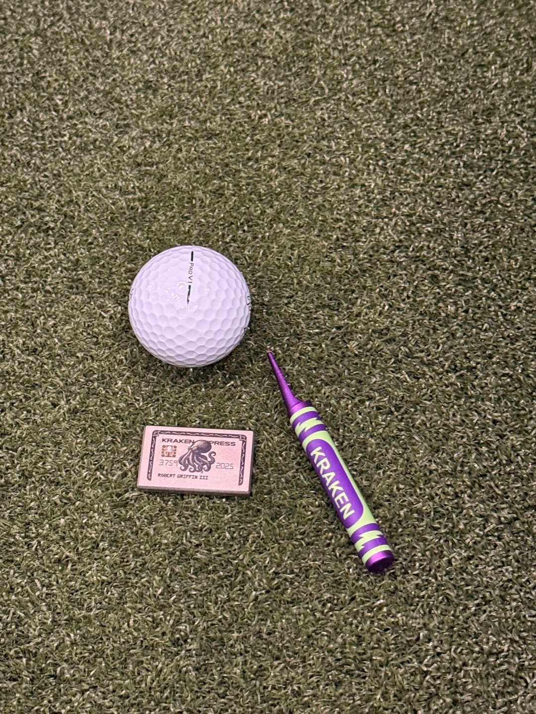 Customer photo review of The Silver Kraken Express Ball Marker | Kraken Titanium Golf Ball Marker