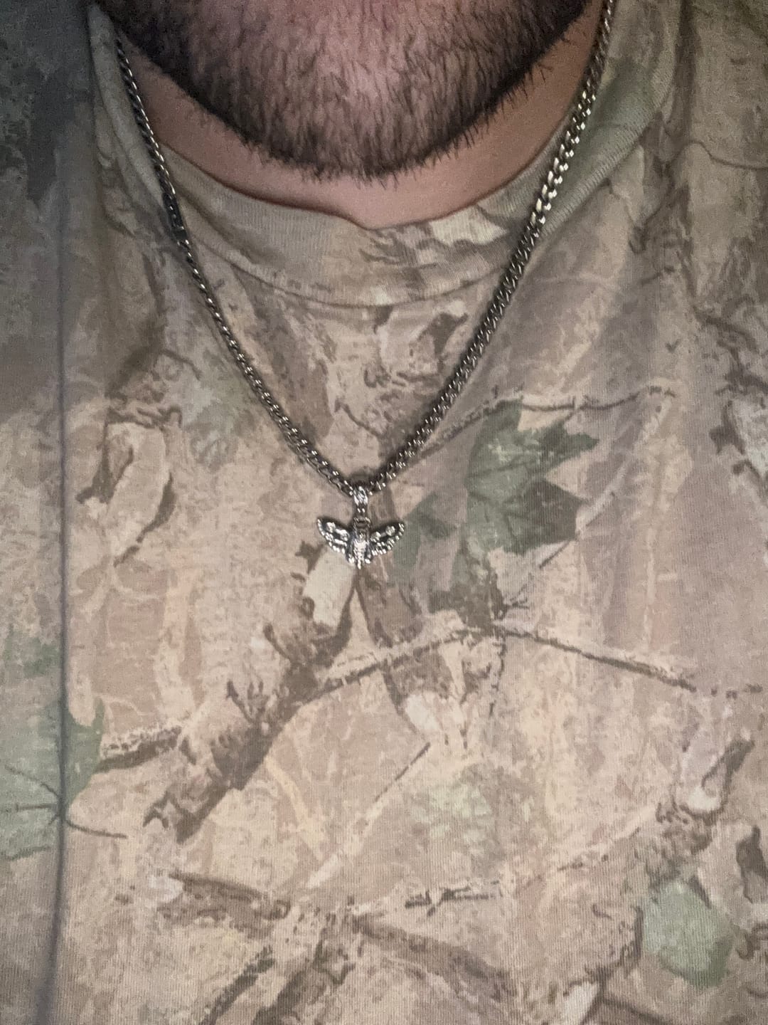 Customer photo review of MOTH PENDANT