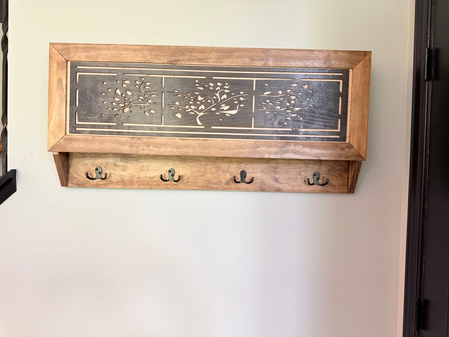 Customer photo review of Family Tree Coat Rack Gun Concealment Decor - Handcrafted Wooden Gun Cabinets - Gun Shelf Hidden Storage for Rifles, Shotguns, & Handguns - Quick Access Hidden Wall Safe