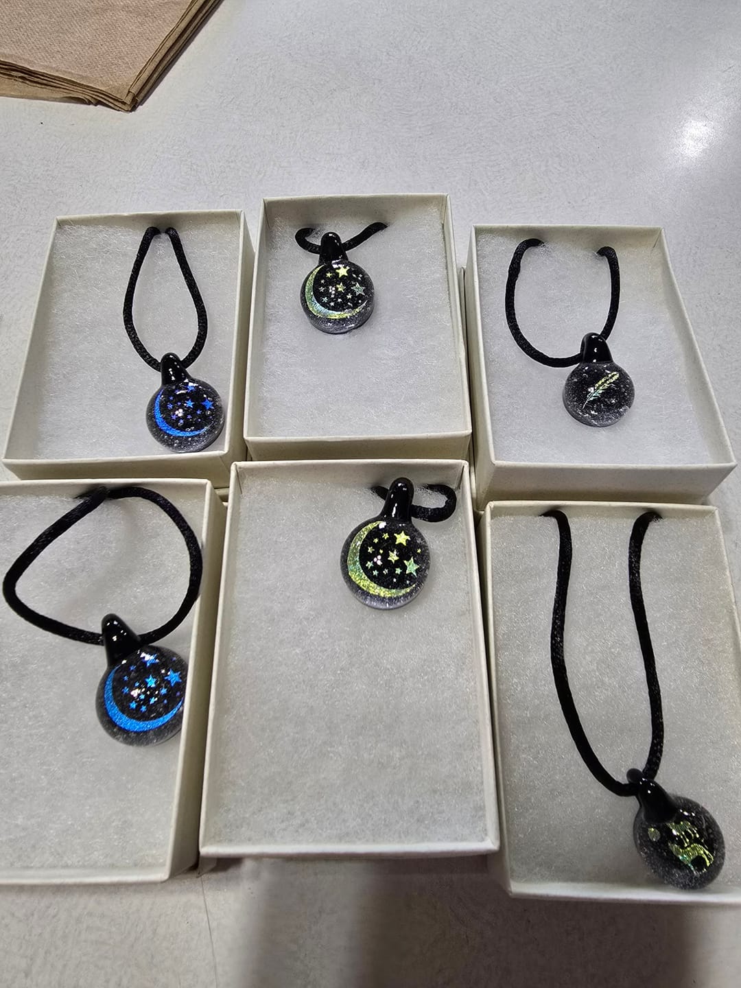 Customer photo review of Feather Hologram Pendant with Infused Cremation Ash