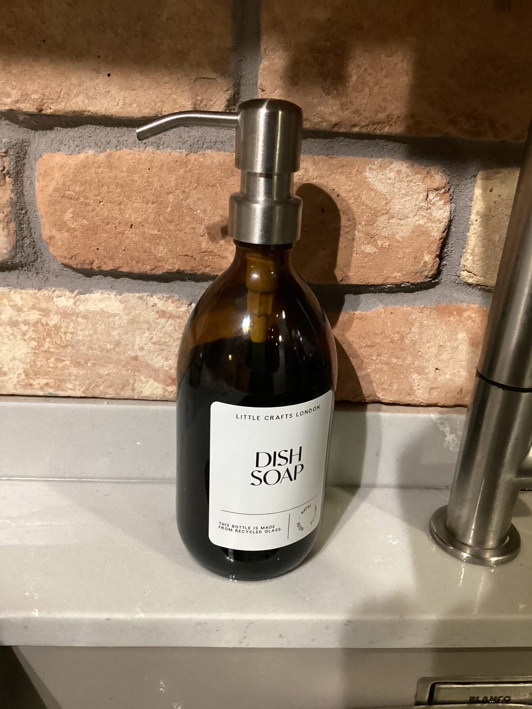 Customer photo review of 500ml Amber Glass Bottle with Metal Pump White Label