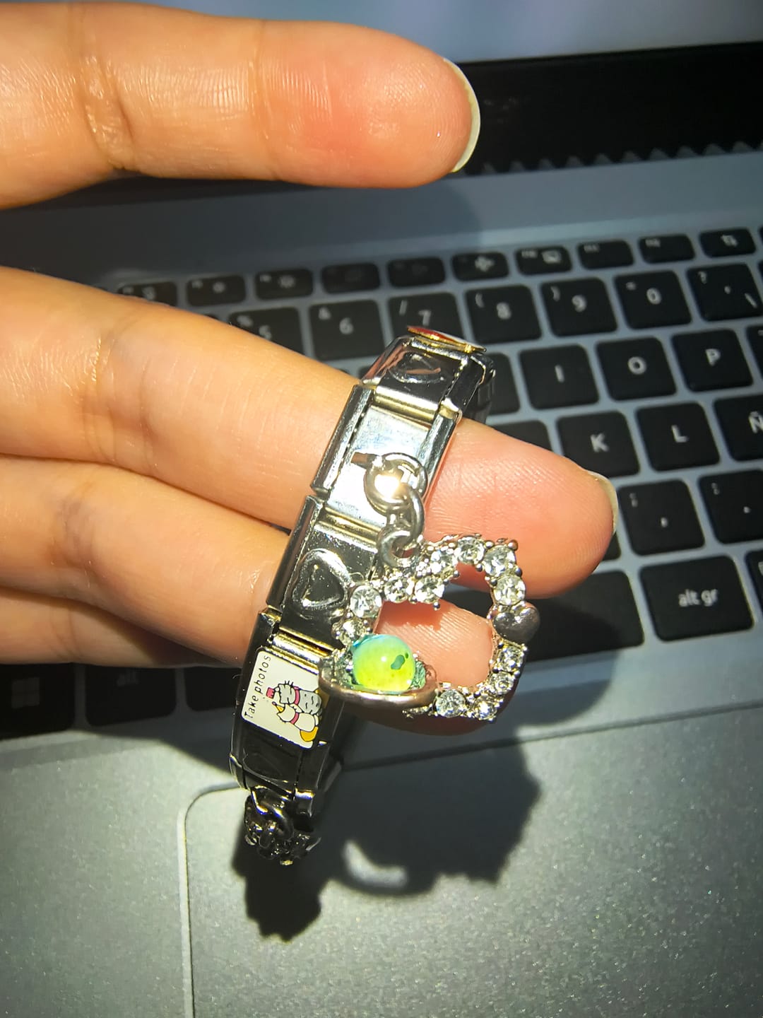 Customer photo review of Charm Corazon Planeta