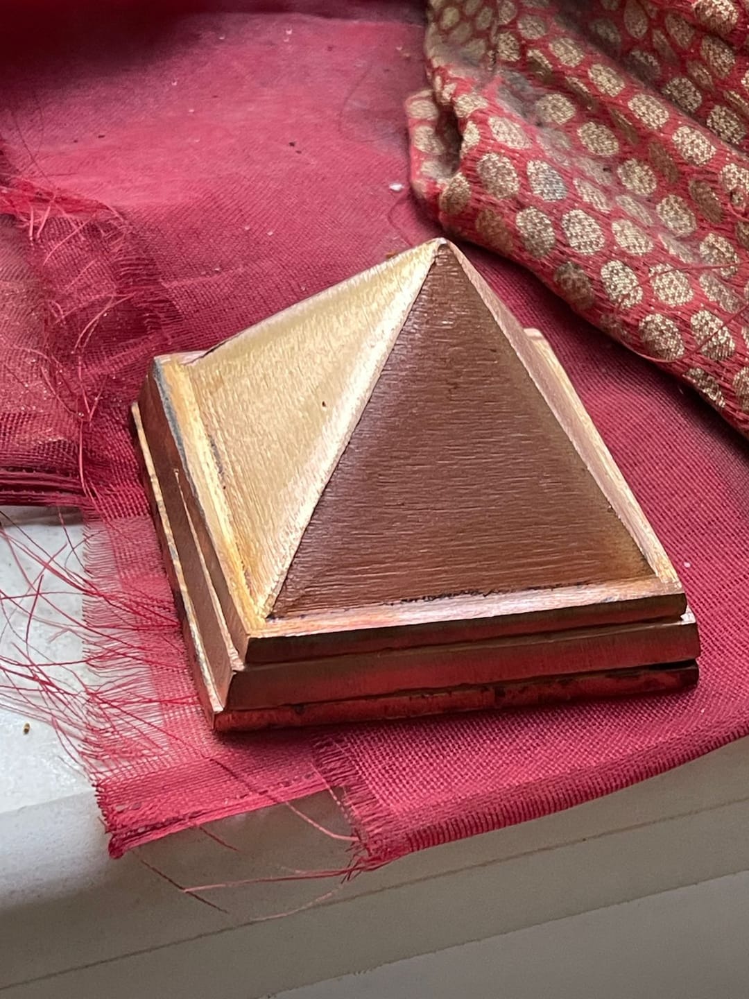 Customer photo review of 3-Layer Copper Pyramid Vastu Remedy for Energy Amplification, Prosperity and South East Direction Activation for Home, Office and Vastu Correction | 5-7.6 cm | 665 g