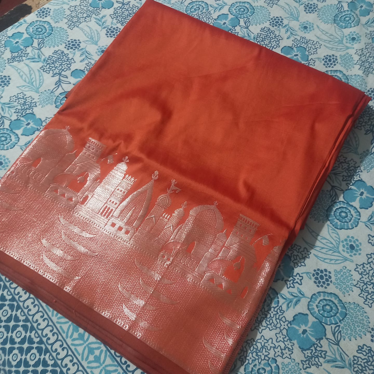 Customer photo review of Orange Kalyug Plain Semi Katan Silk Banarasi Saree