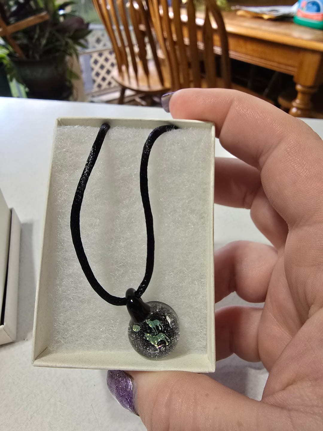 Customer photo review of Howling Wolf Hologram Pendant with Infused Cremation Ash