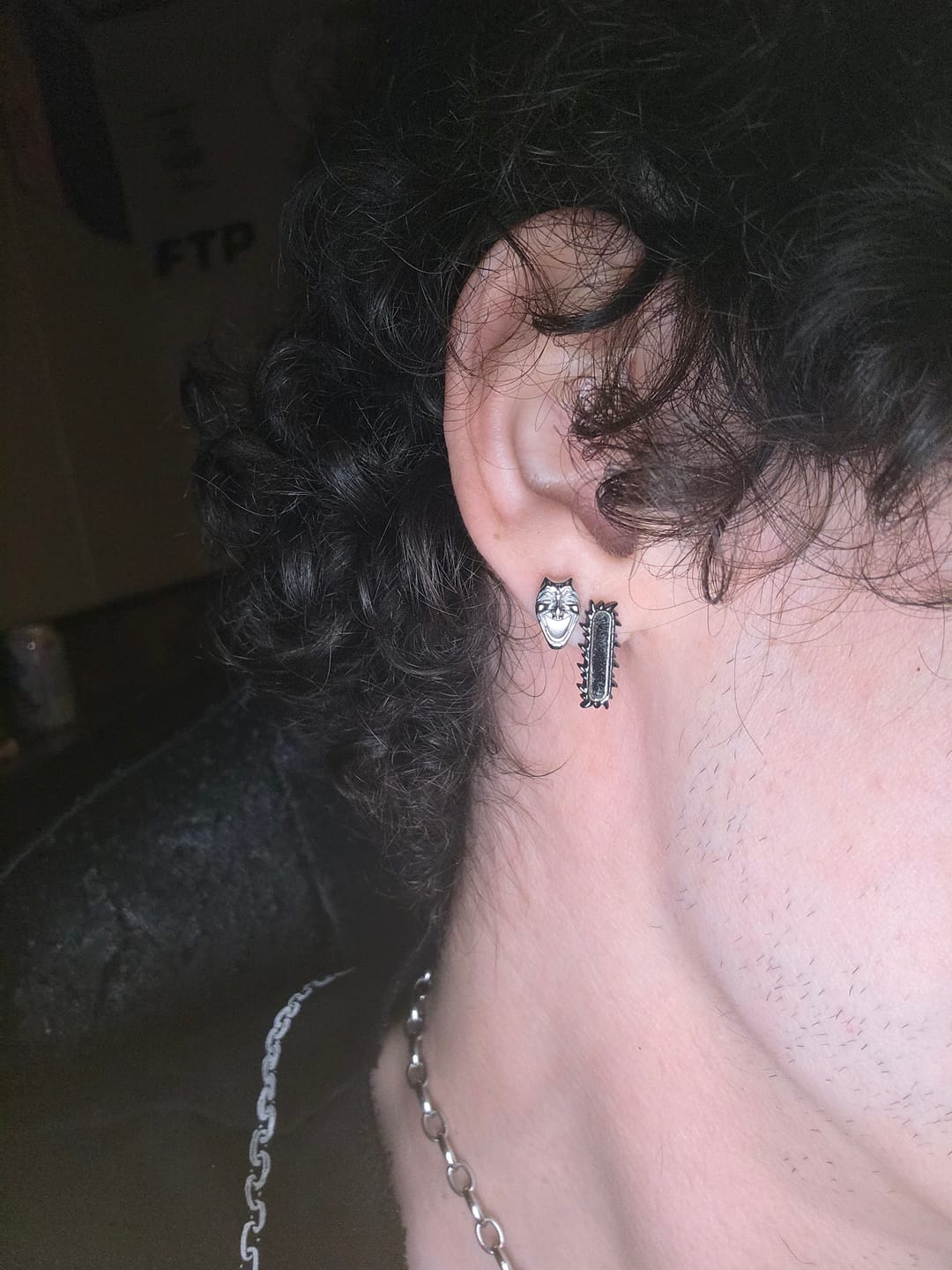 Customer photo review of LAUGH NOW, CRY LATER STUD EARRINGS