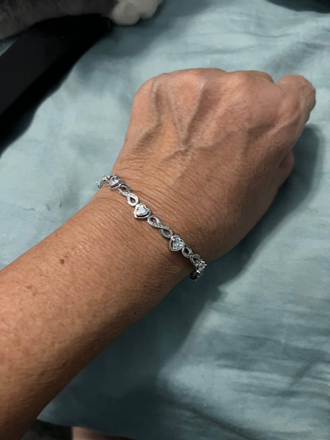 Customer photo review of Amanda 18k White Gold Plated Infinity Heart Tennis Bracelet with Simulated Diamond Crystals