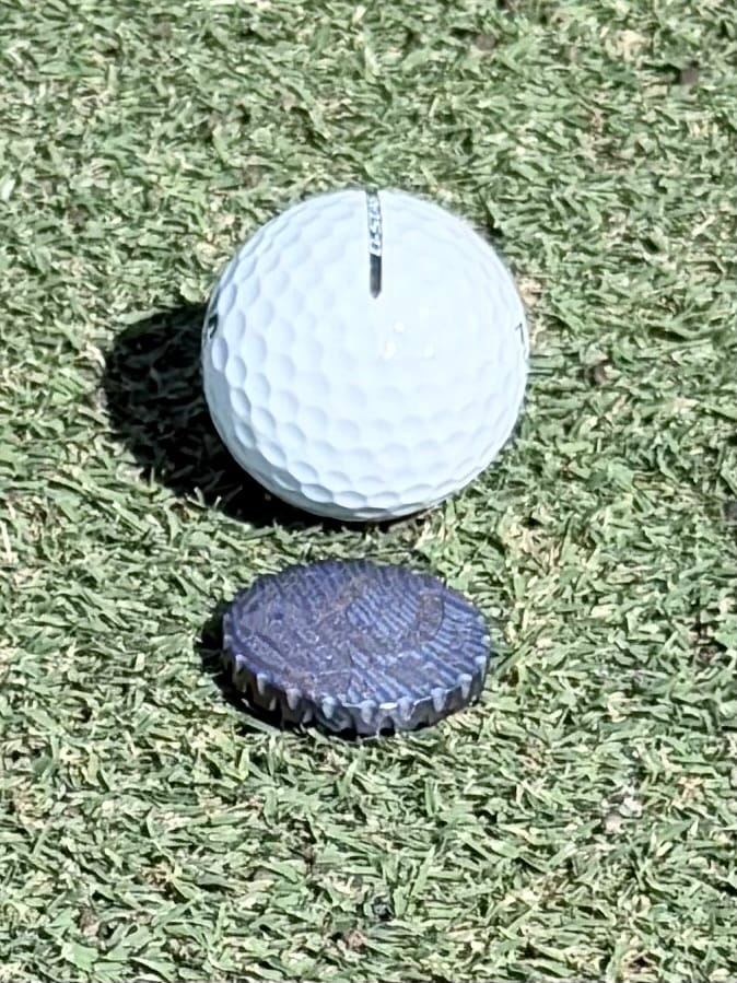 Customer photo review of HOBO LUCK GOLF BALL MARKER - TIMASCUS EDITION