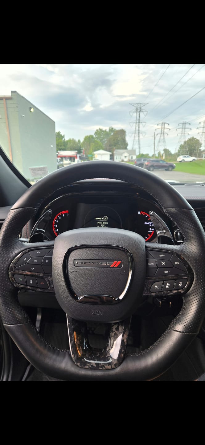 Customer photo review of Real Carbon Fiber Steering Wheel Button Trim Covers | 2015-2023 Dodge Charger Challenger Durango