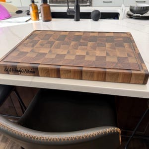 Customer photo review of Personalized Cutting Boards for 5+ — Family, Corporate & Closing Gifts
