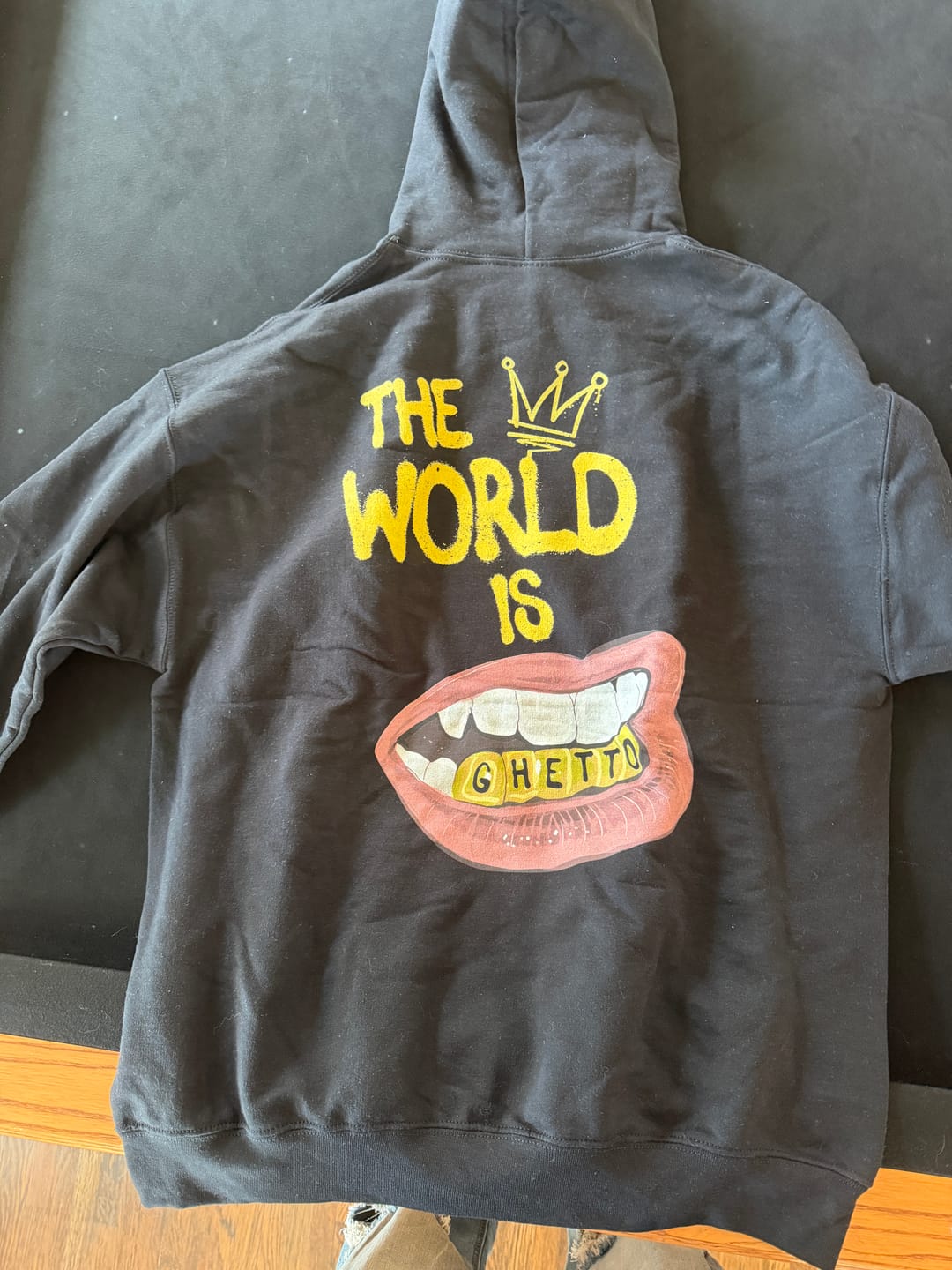 Customer photo review of The World Is Ghetto Hoodie