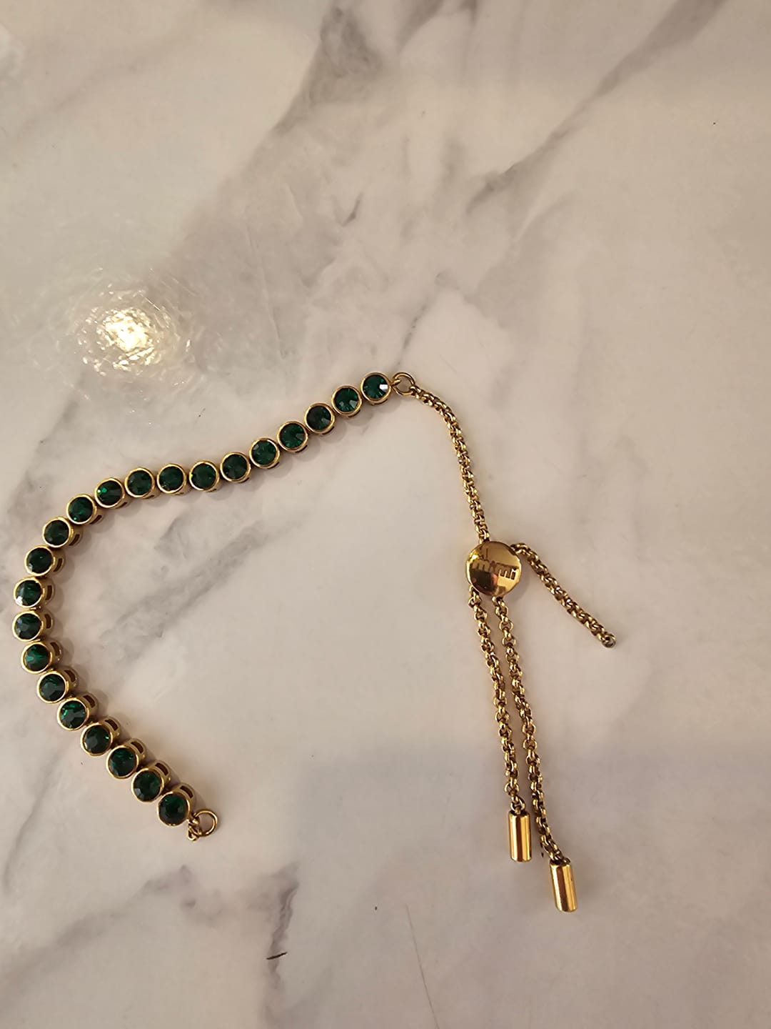 Customer photo review of Tomi Gold Green Tennis Bracelet