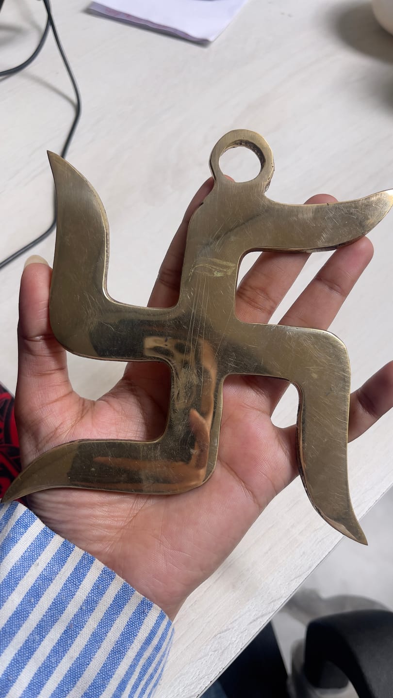 Customer photo review of Brass Swastik Wall Symbol | Vastu Remedy for Main Entrance & Auspicious Energy | 5 & 9 Inch