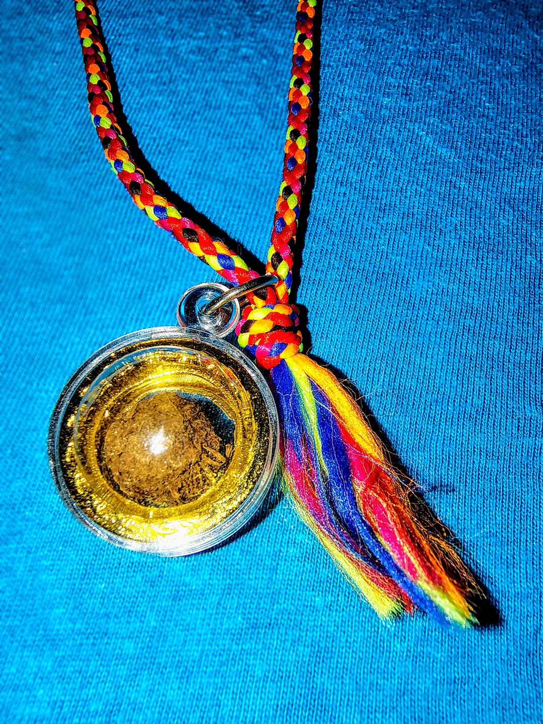 Customer photo review of Amulette Thai bille sacrée Look Aum Sian Mak d'invulnérabilité - Très Vénérable LP Kui.