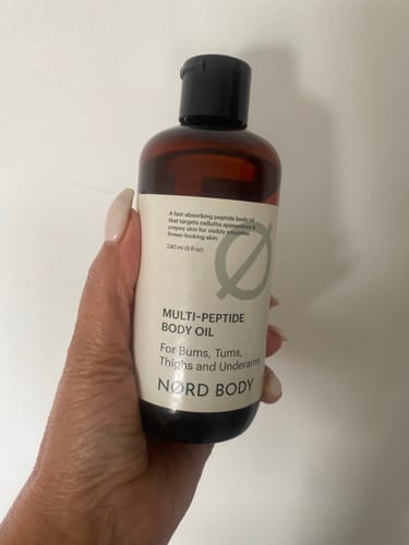 Customer photo review of NØRD BODY Peptide Body Oil (rev)