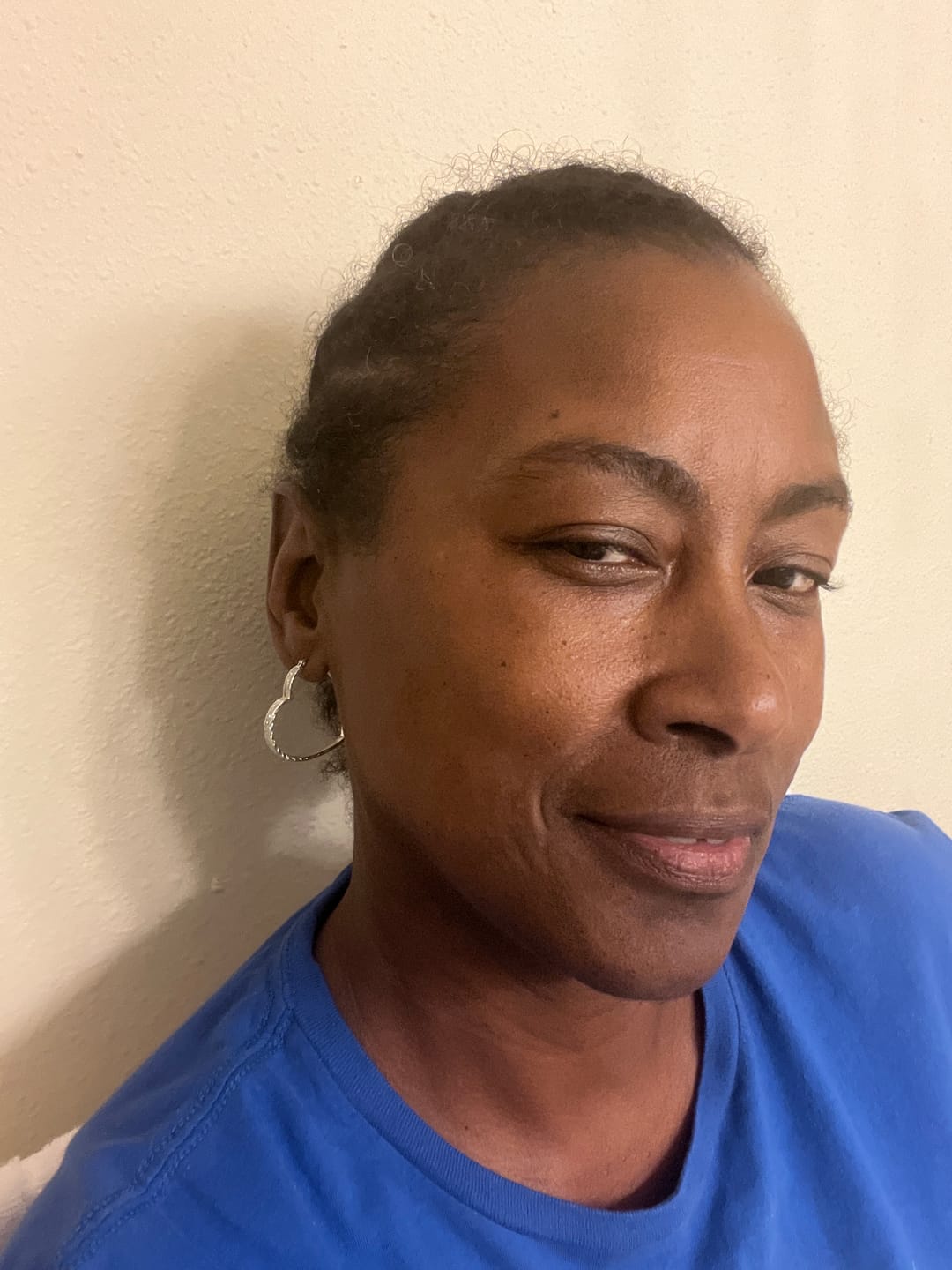 Customer photo review of Sterling Silver Open Heart Diamond-Cut Hoop Earrings