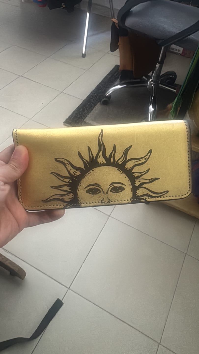 Customer photo review of CARTERA SOL ORO