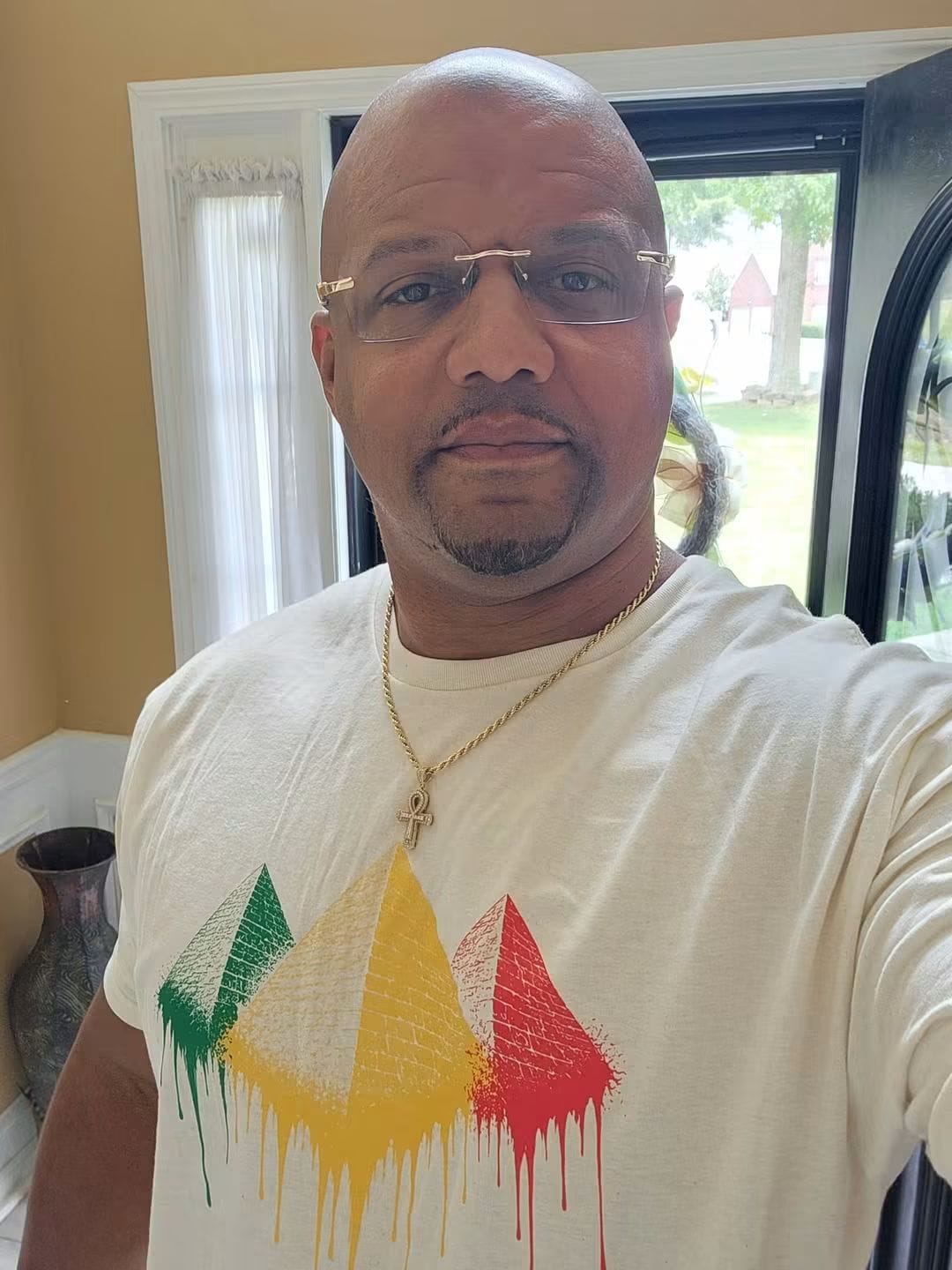 Customer photo review of Heritage Drip Pyramid Tee