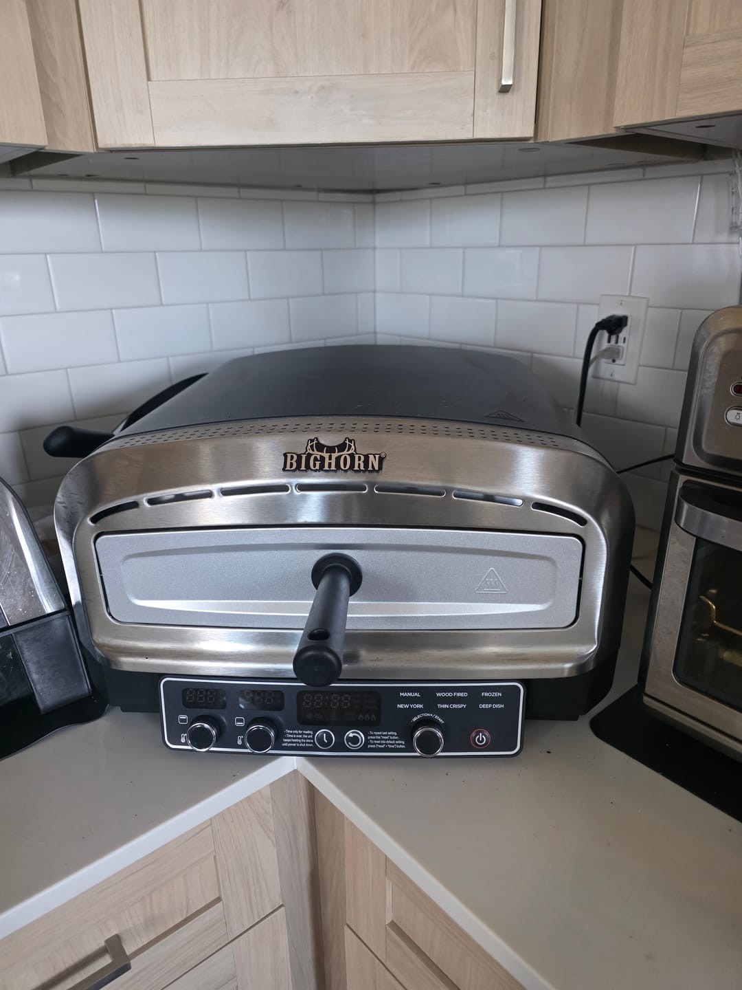 Customer photo review of 14" Indoor Electric Countertop Pizza Oven with 6 Preset Modes, Stainless Steel