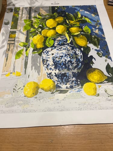 Customer's Lemon bouquet Paint by Number canvas, showing a partially painted lemon arrangement in a blue vase.