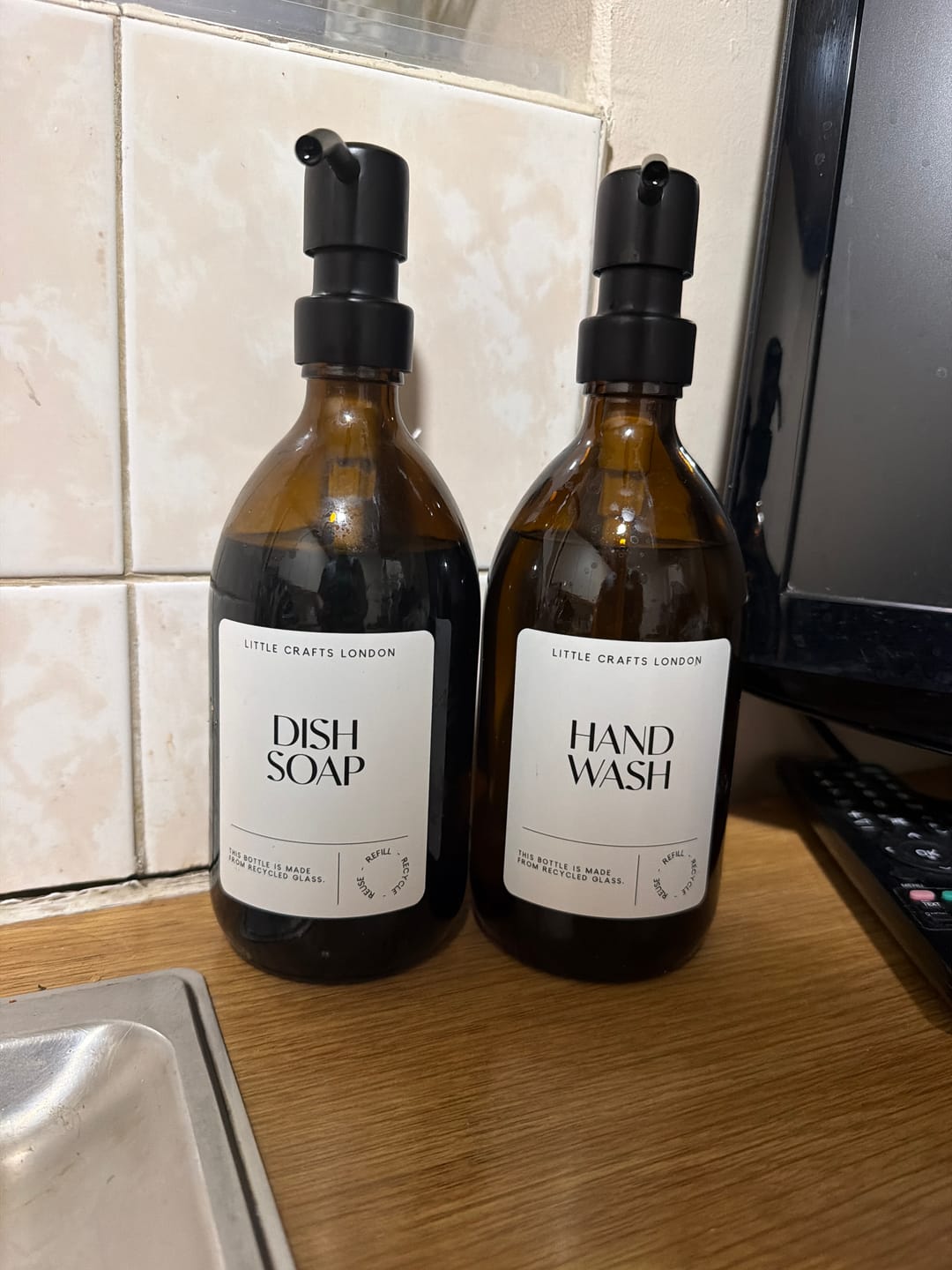 Customer photo review of 500ml Amber Glass Bottle with Metal Pump White Label