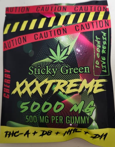 Customer's Cherry flavored XXXtreme Gummies packaging with caution tape design.