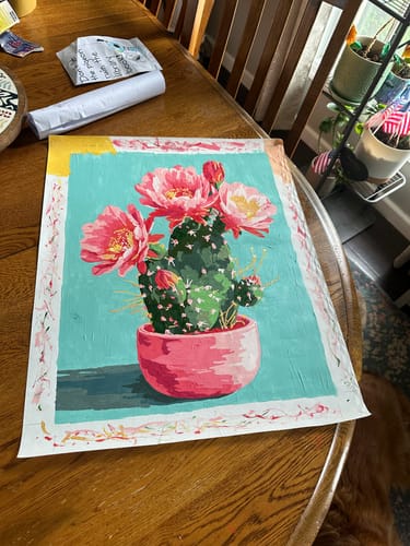 Customer's completed Blooming cactus paint by number canvas featuring a potted green cactus with pink flowers.