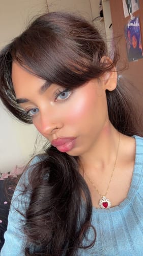 Customer's Sky Opticcolors contact lenses worn by a person, showing a natural light blue color on the eyes.