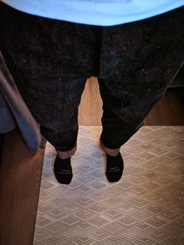 Customer's Easy Guy Mezuki Selvedge denim jeans from a top-down view, showing textured fabric.